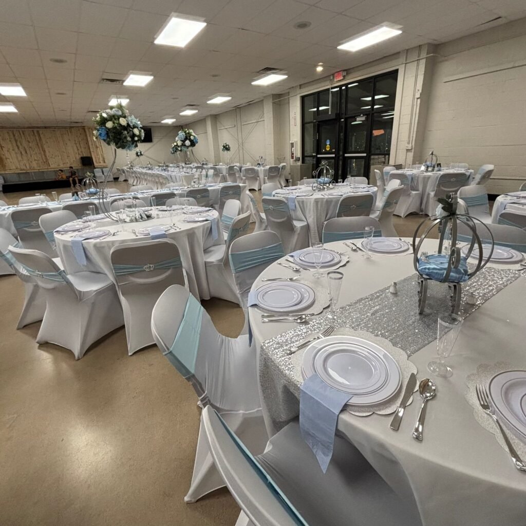 Image of fancifully decorated tables at a wedding or quinceañera