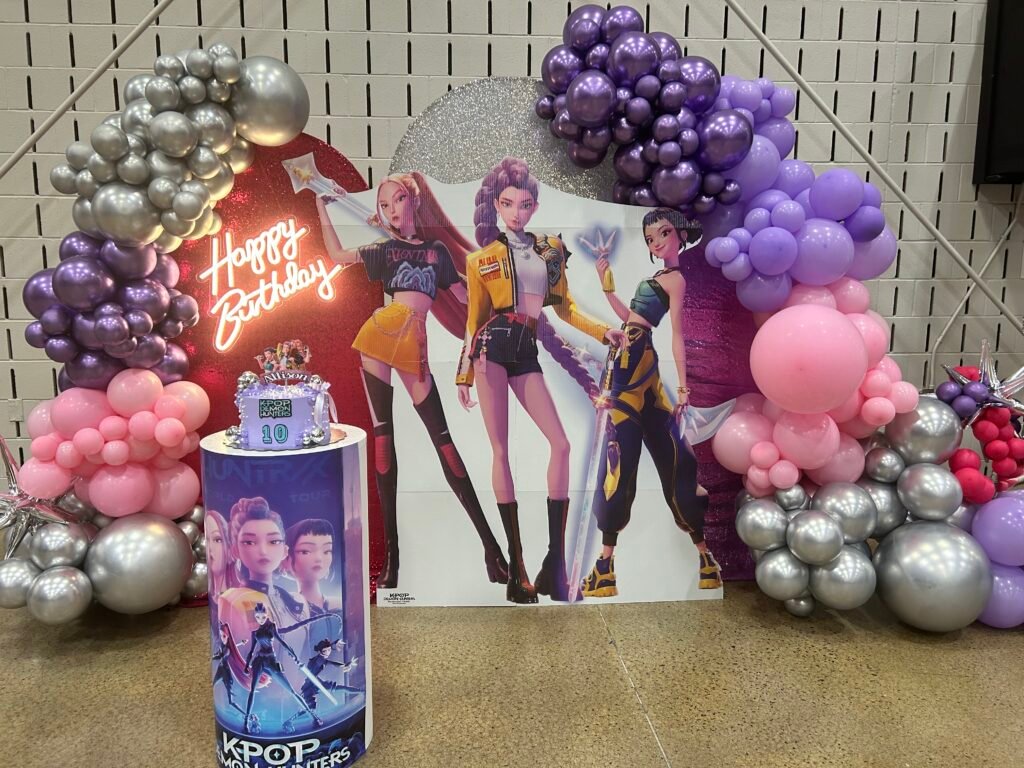 Pop culture style happy birthday sign with balloons